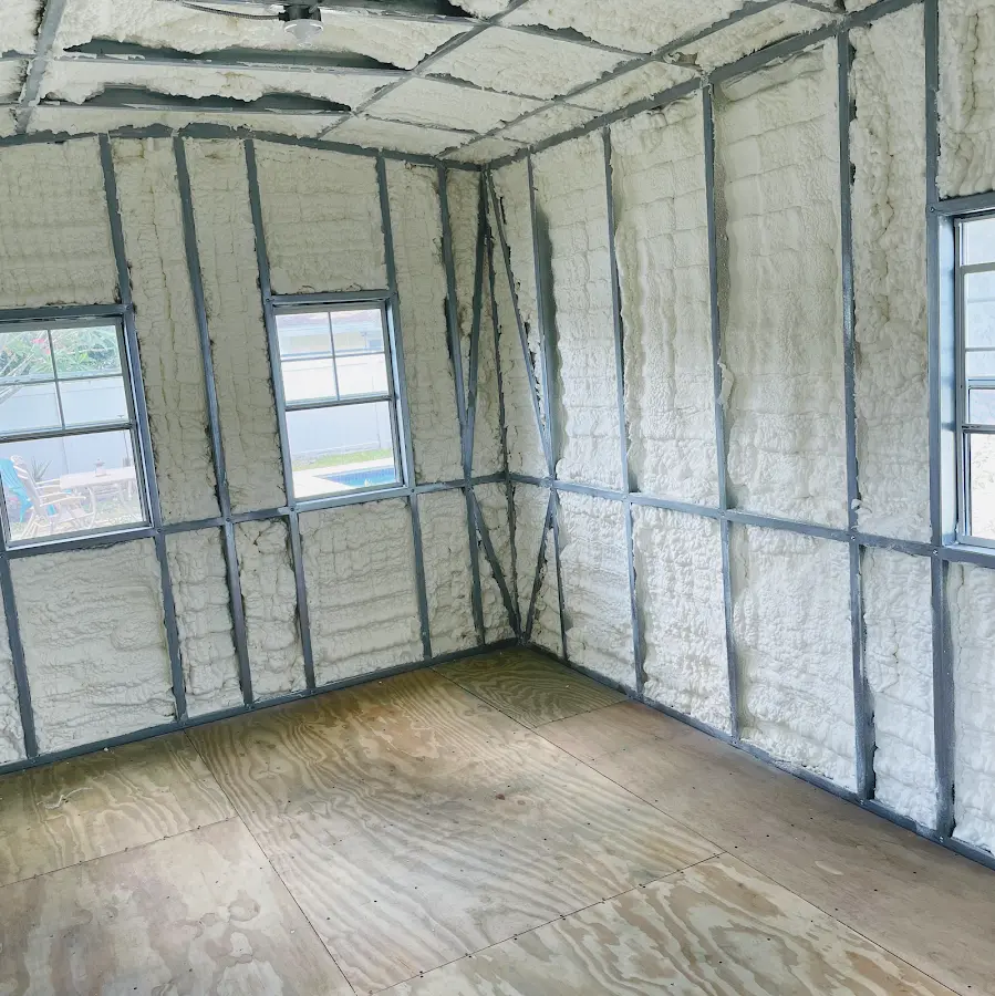 Closed-cell spray foam insulation applied to wall cavities in a residential project in Brook Park